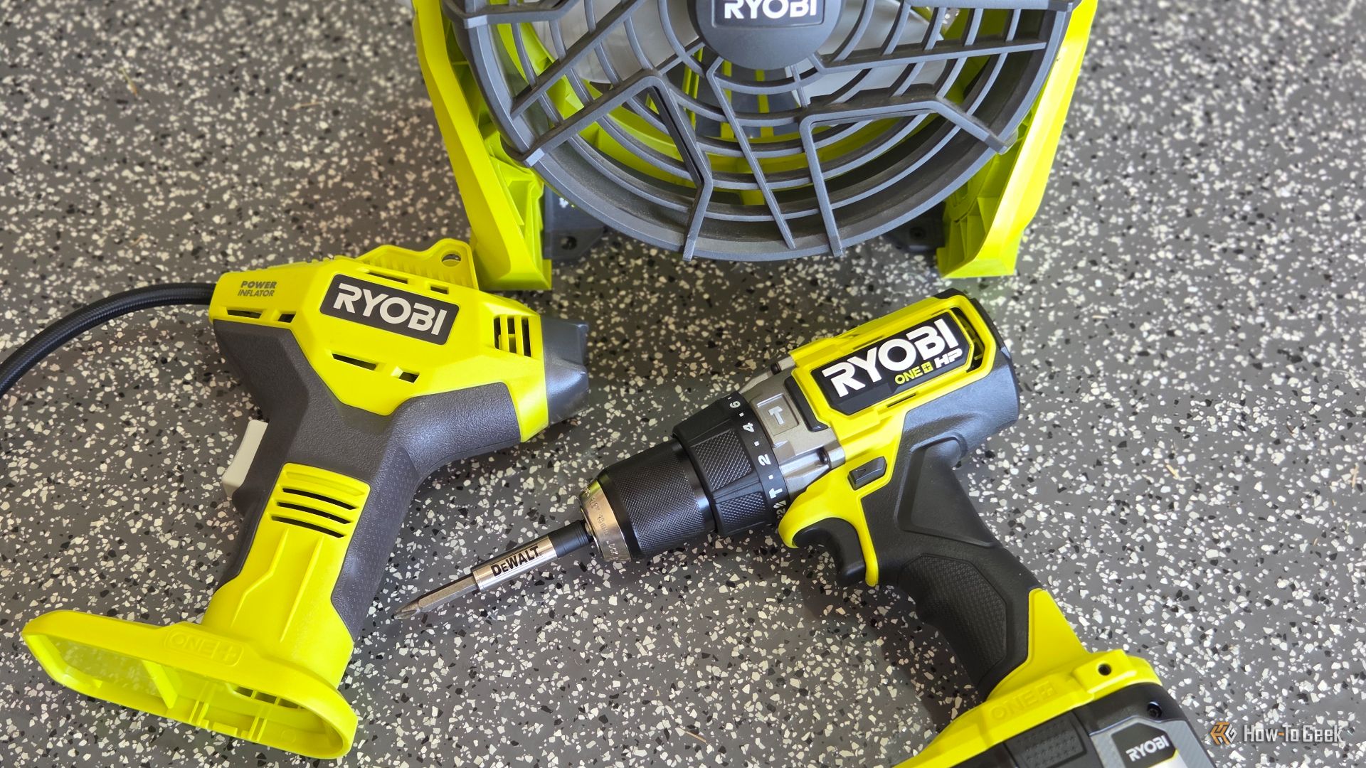 Ryobi tools on a garage floor