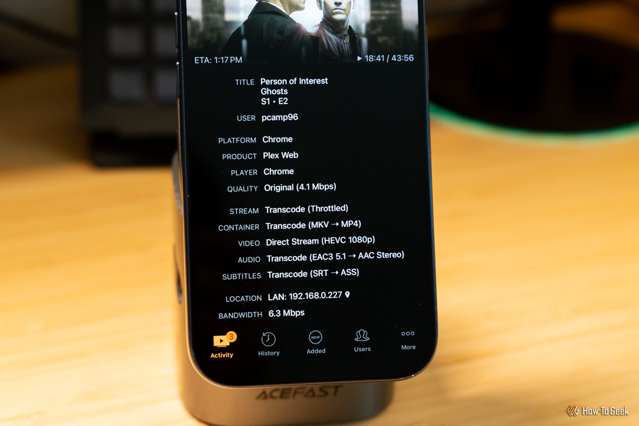 Tautulli showing Plex HEVC direct stream with EAC3 audio and SRT subtitle transcoding on iPhone.
