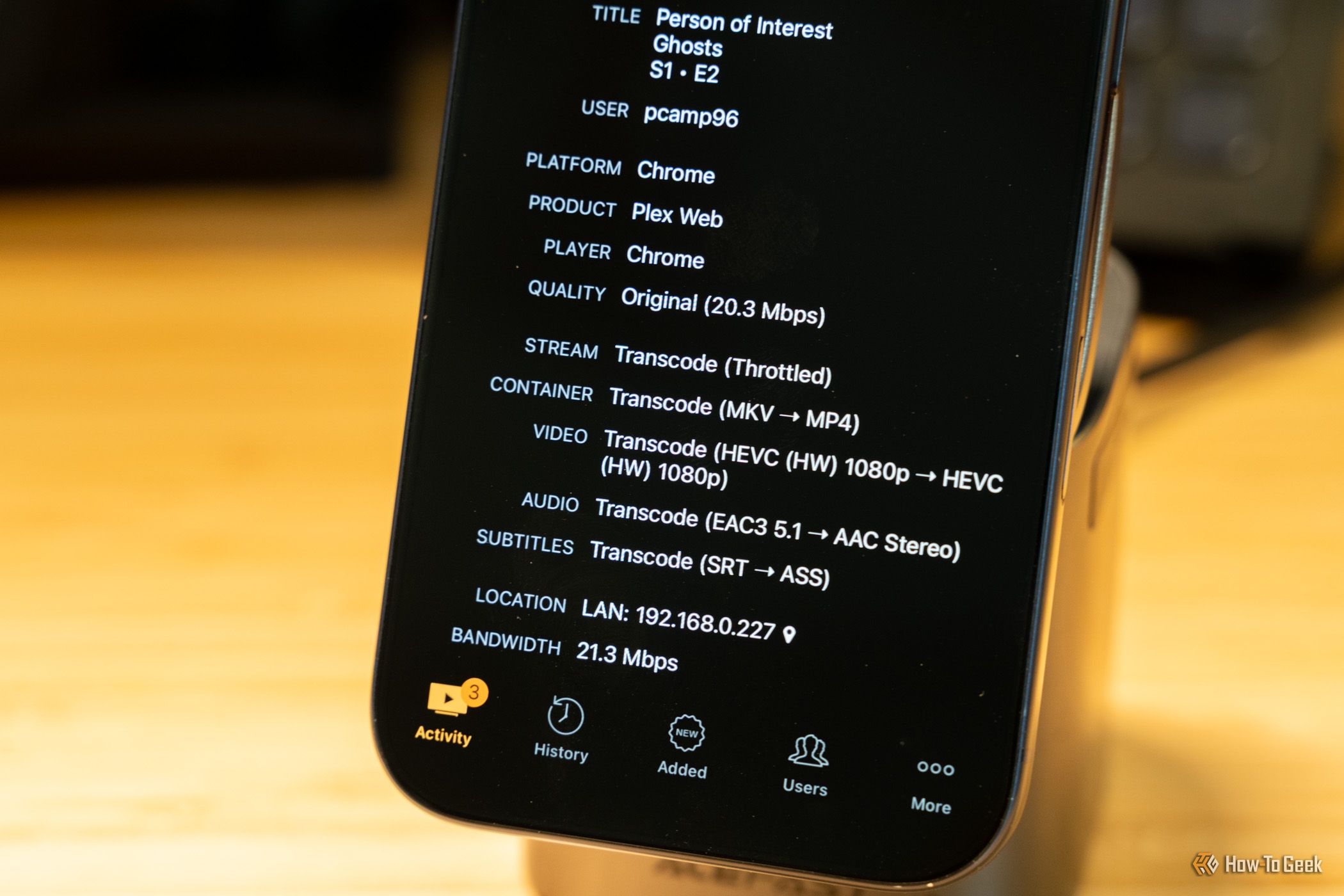 Tautulli showing Plex HEVC video EAC3 audio and SRT subtitle transcoding on iPhone.