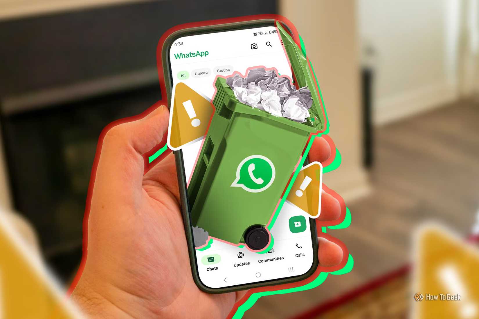 WhatsApp アプリ上の携帯電話。ゴミ箱がいっぱいで、いくつかの警告サインが表示されます。