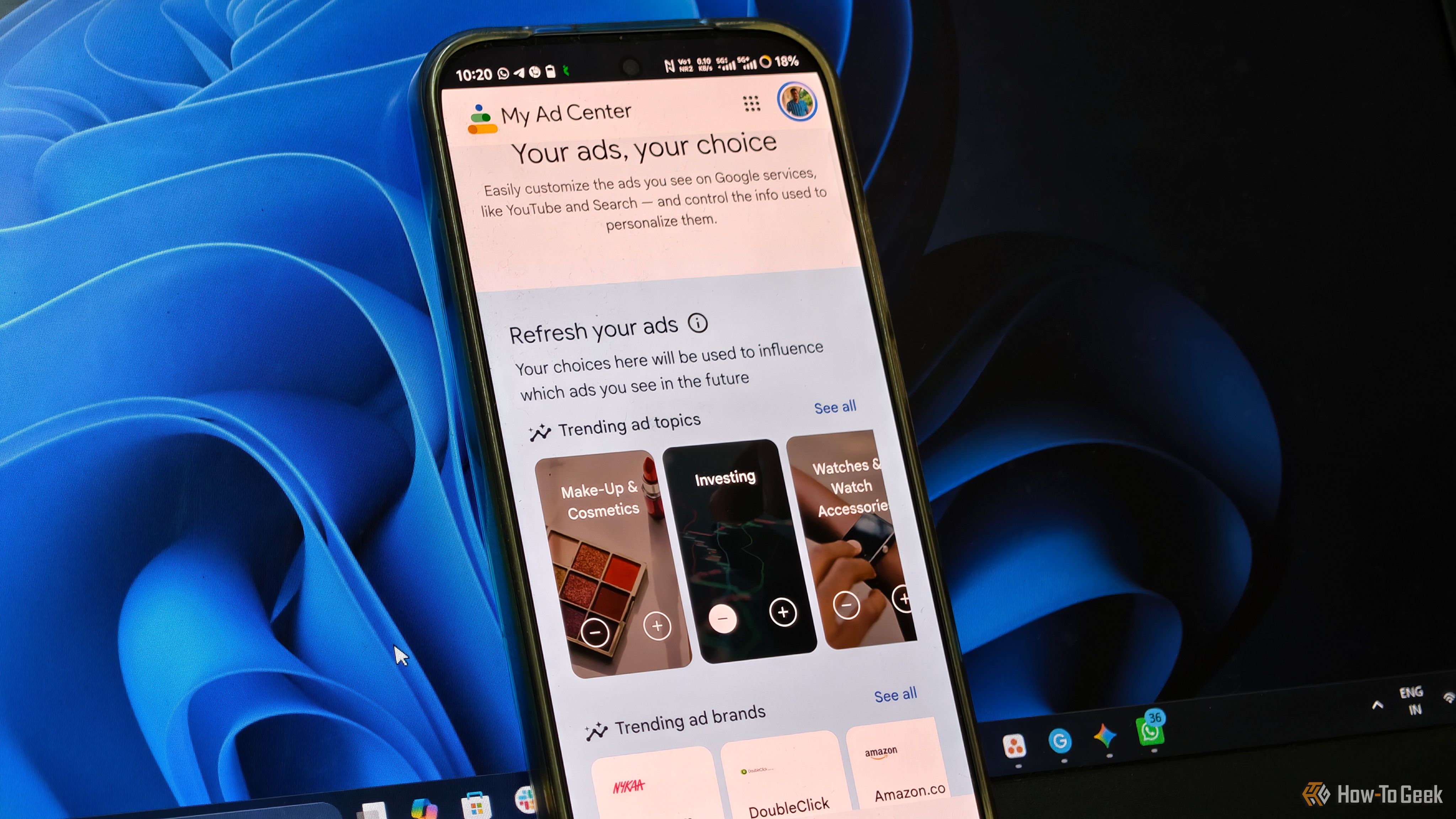 Android phone displaying Google My Ad Center with controls for personalized ad topics and brands.