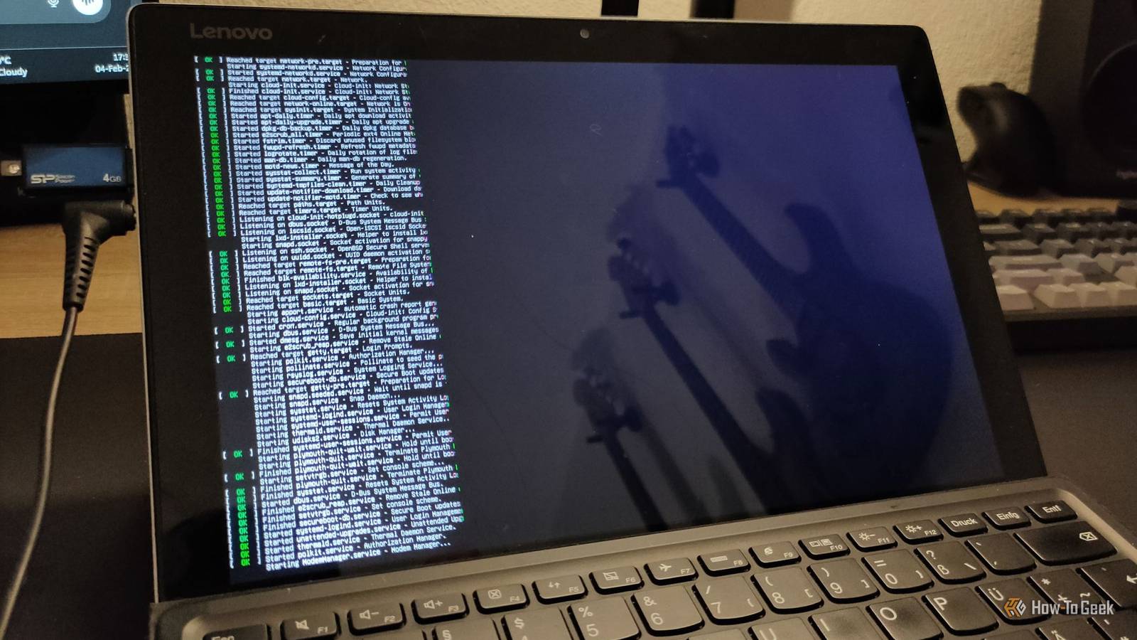 A broken laptop having Linux Ubuntu Server being installed on it.