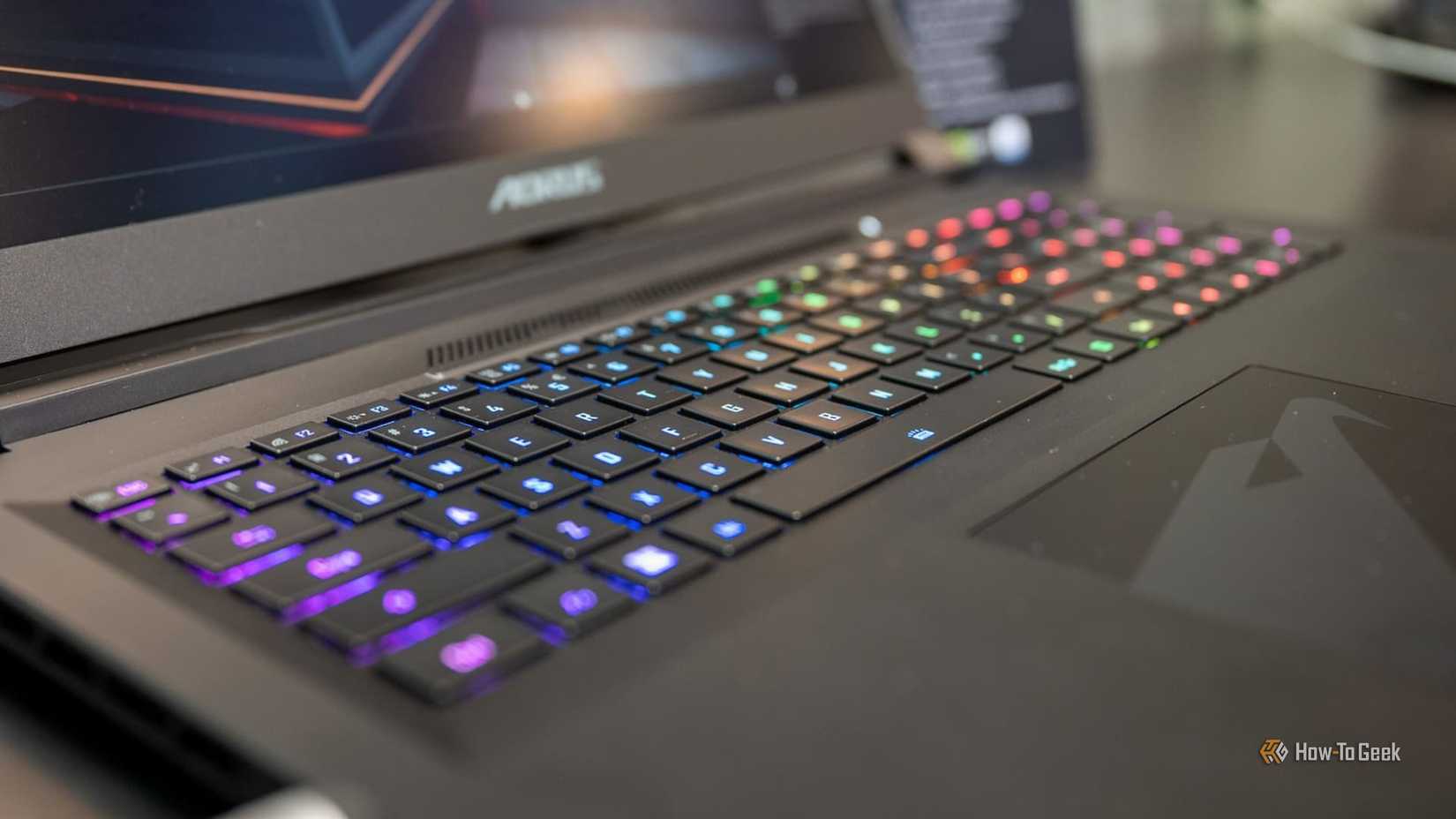 Close up of a green and yellow gaming laptop RGB keyboard