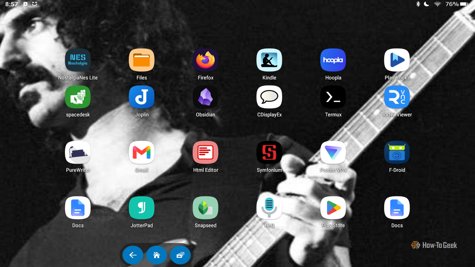 An image of a musician playing guitar with rows of Android apps covering the home screen and blue navigation icons at the bottom of the screen.