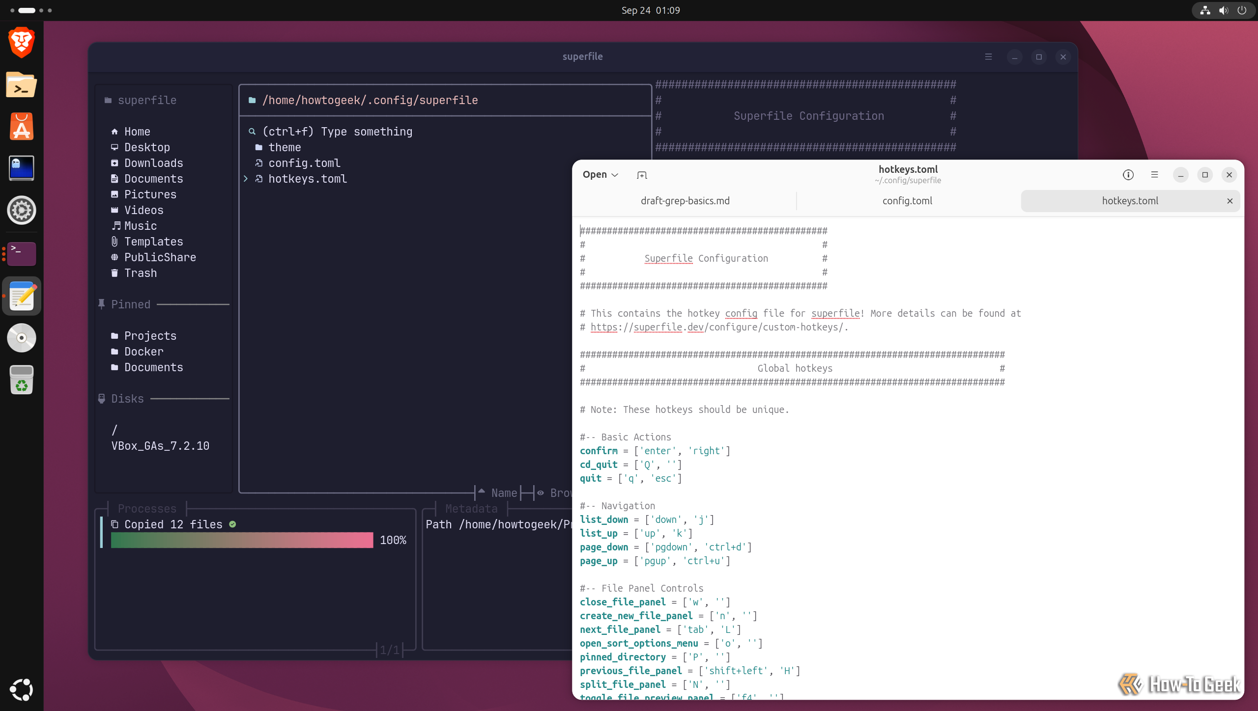 hotkeys.toml open in a text editor listing the basic action, navigation, and file panel keybindings.