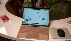 Microsoft Surface Laptop 13-inch 2nd Edition tan model running Sensory Studio Zen Garden.