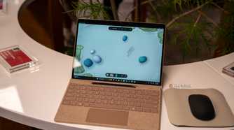 Microsoft Surface Laptop 13-inch 2nd Edition tan model running Sensory Studio Zen Garden.
