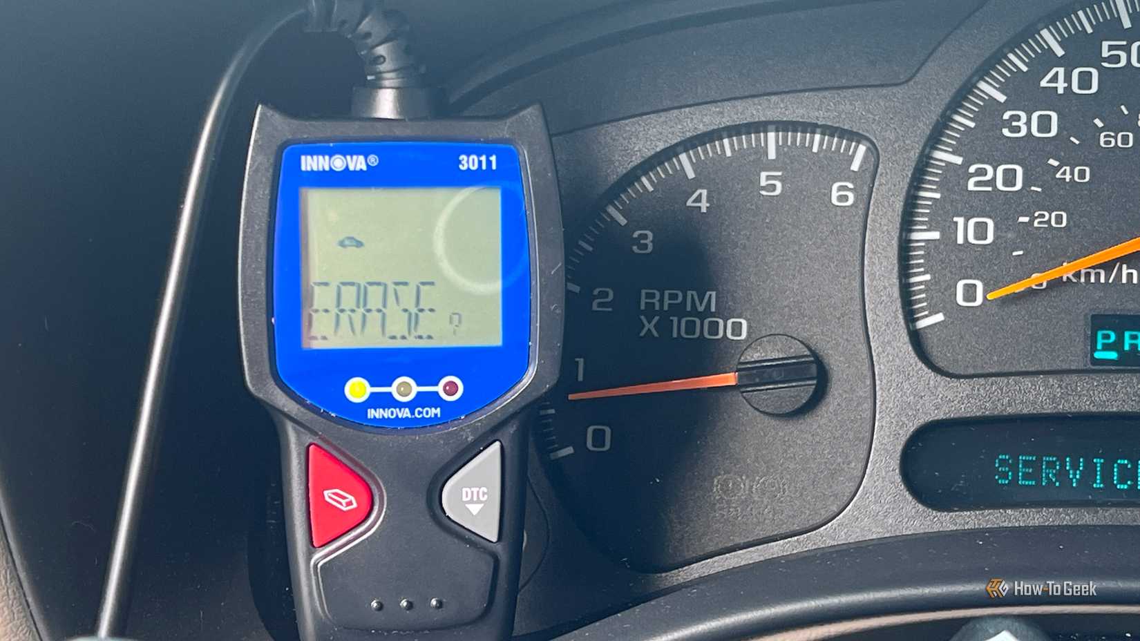 An Innova 3011 OBD-II scanner ready to erase a diagnostic trouble code.