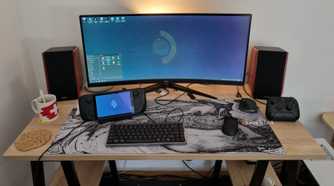 A docked Steam Deck used as a mini PC desktop.