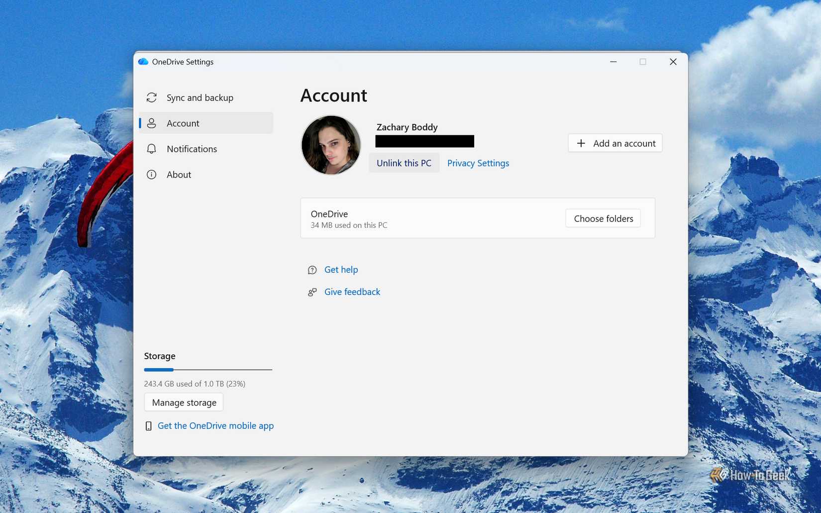 Screenshot of OneDrive's settings in Windows 11 and the "Unlink this PC" button.