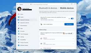 Screenshot of Windows 11's Settings and the "Mobile devices" page.