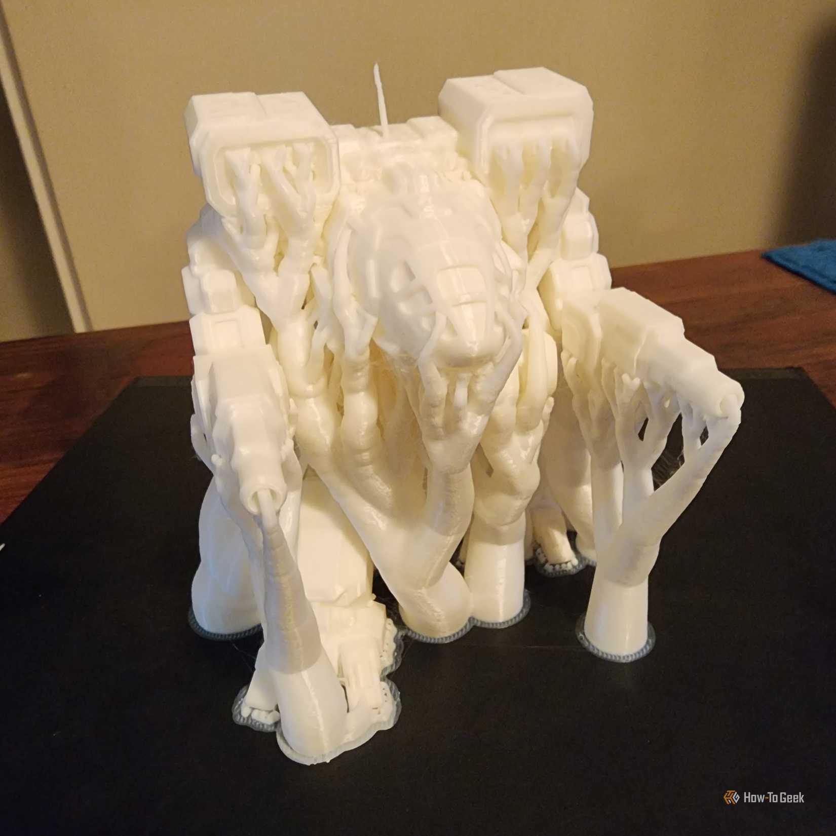 A Mechwarrior 3D printed model. covered in tree supports.