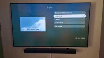 The Apple TV app is showing subtitle options to change styles with large text selected.