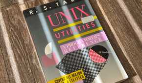 A book titled UNIX Utilities by R. S. Tare, featuring a vintage design with geometric shapes.