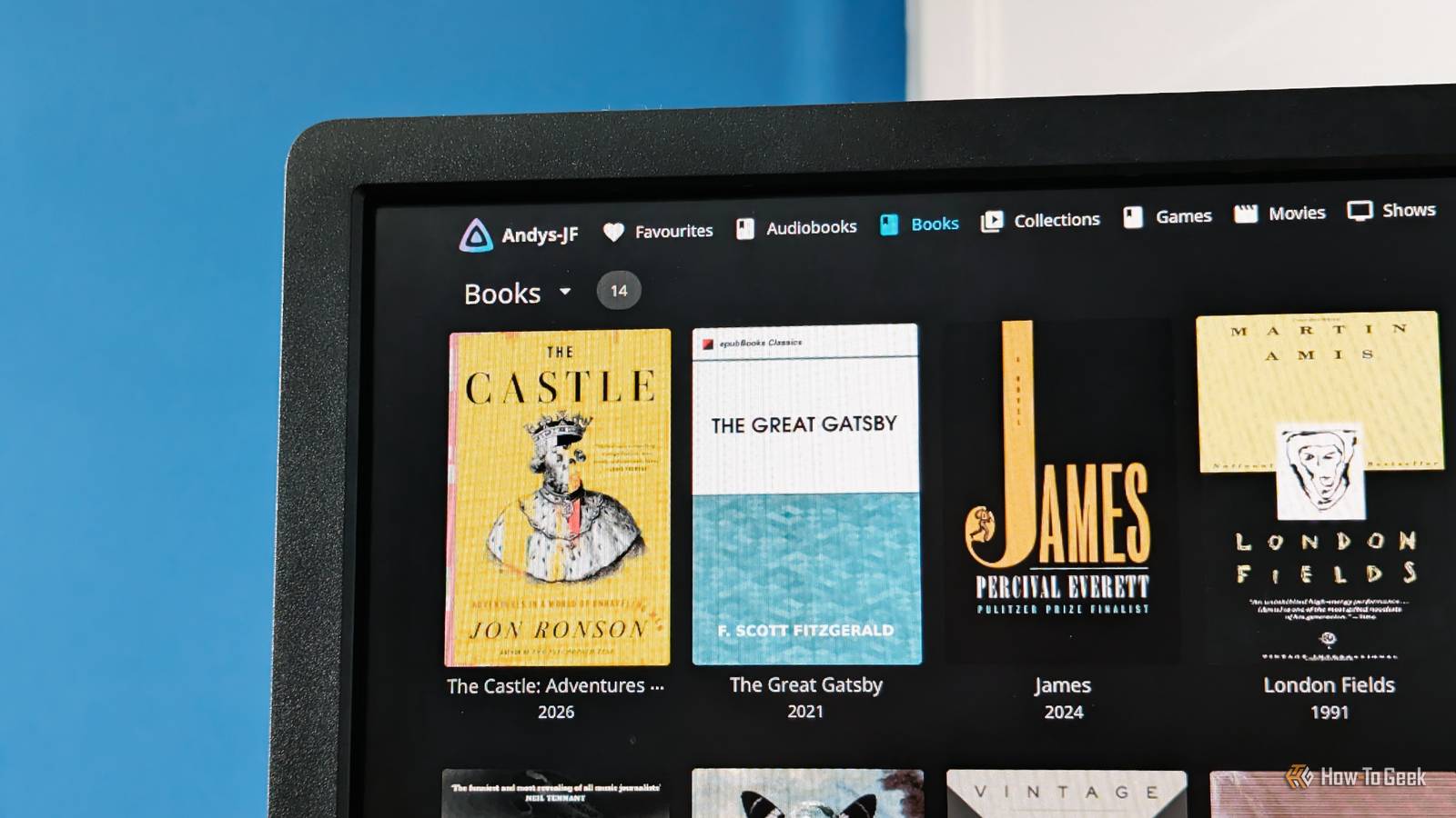 A monitor showing a Jellyfin book library.