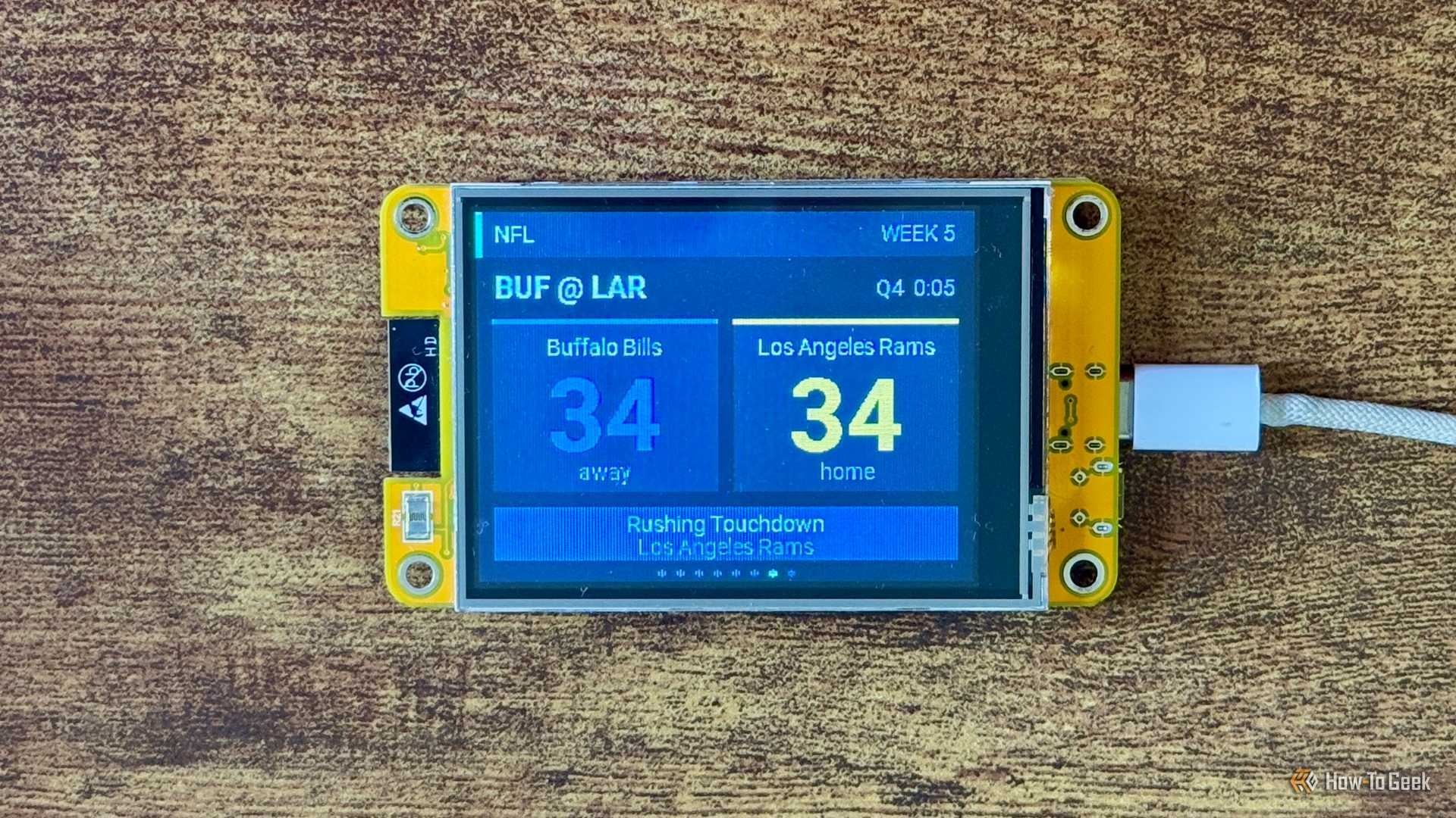 Cheap Yellow Display NFL scoreboard showing Buffalo Bills and Los Angeles Rams tied 34 34 with five seconds left after a Rams Rushing Touchdown.