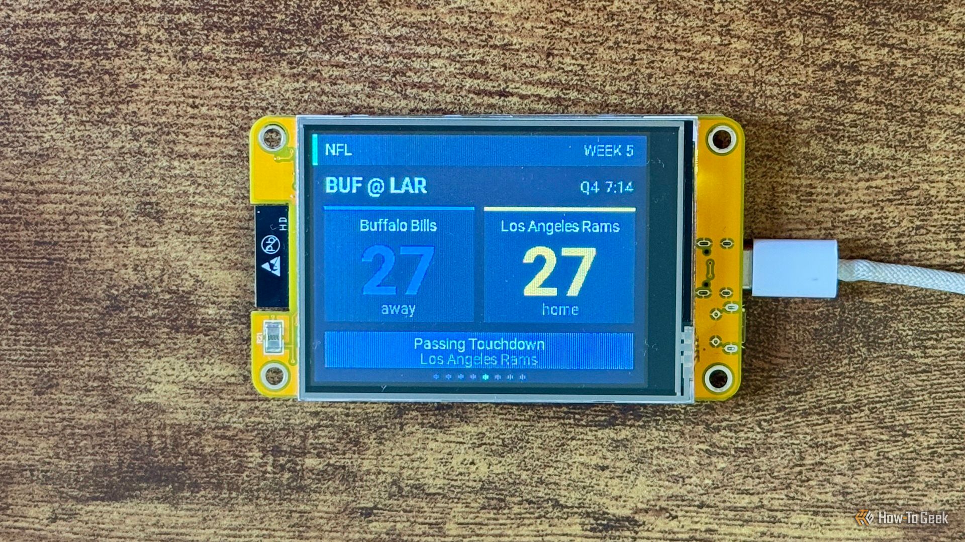 Cheap Yellow Display NFL scoreboard showing Buffalo Bills at Los Angeles Rams tied 27 27 with a Los Angeles Rams Passing Touchdown alert.