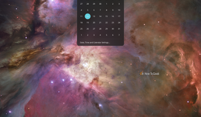 COSMIC calendar dropdown open from the top panel clock showing October 2026.
