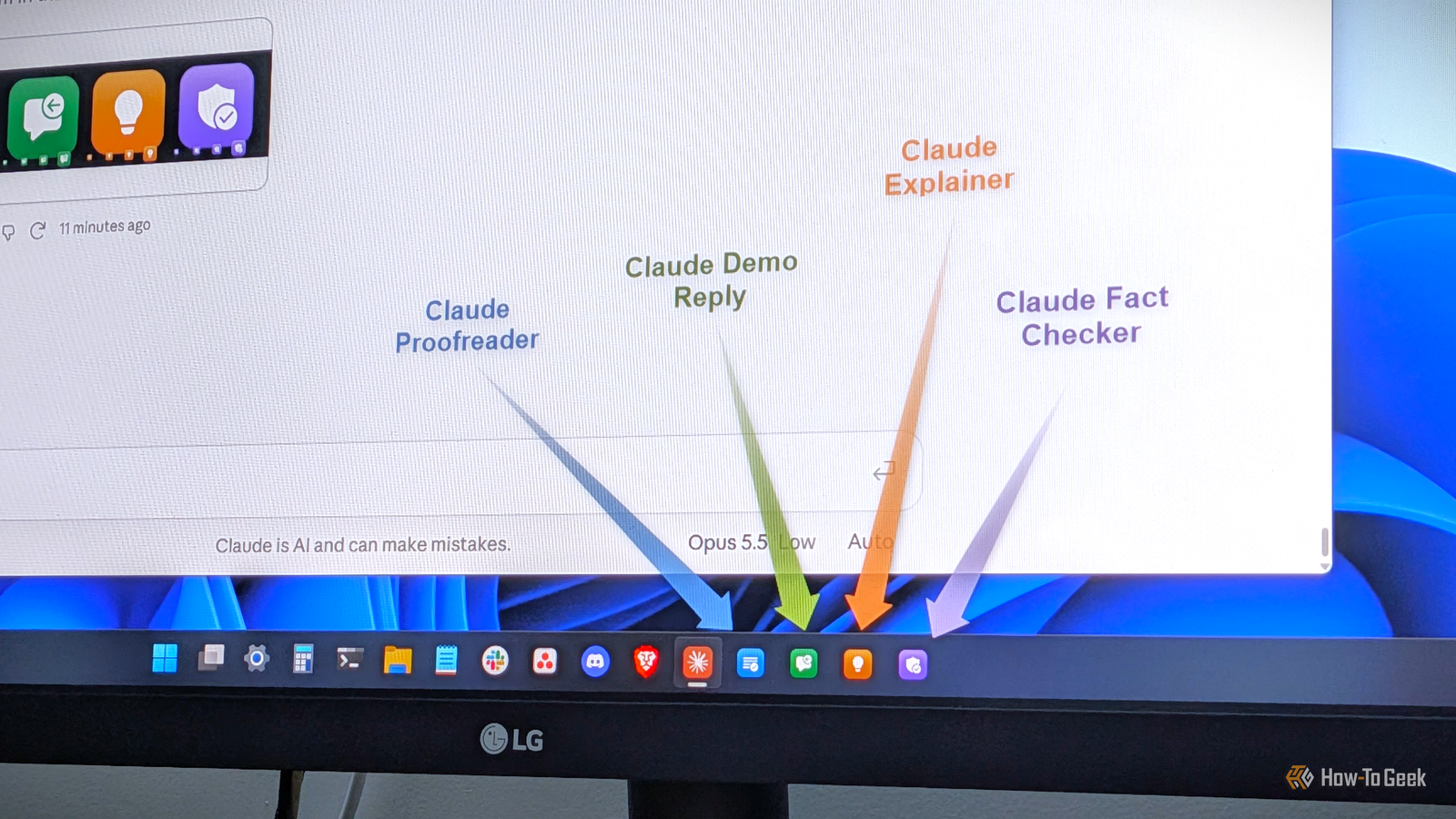 Four color-coded Claude shortcuts labeled Proofreader, Demo Reply, Explainer, and Fact Checker in the Windows 11 taskbar on an LG monitor.