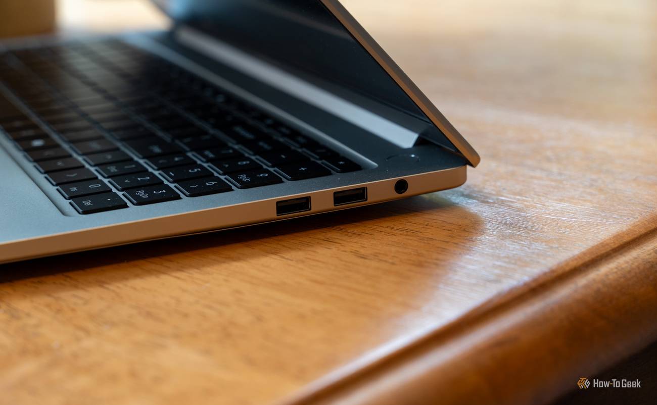Right side of the GEEKOM GeekBook M16 with two USB-A ports and a headphone jack.
