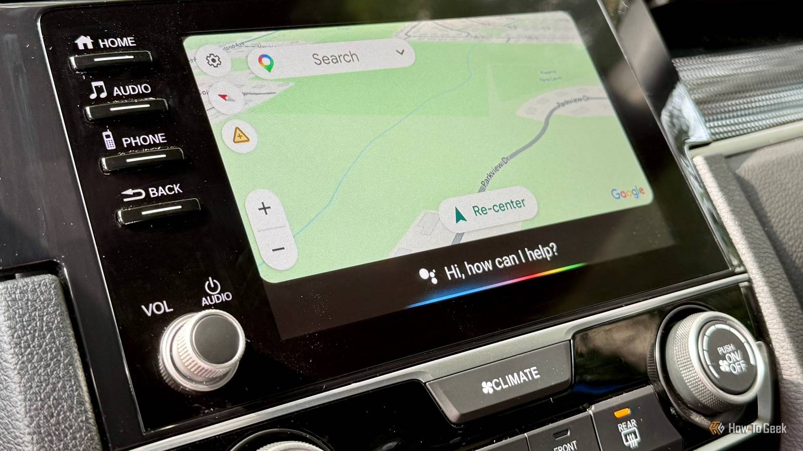 Google Maps app open on Android Auto with Google Assistant enabled.