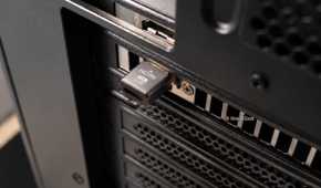 A picture showing Hdmi dummy plug interested in a GPU.