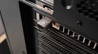 A picture showing Hdmi dummy plug interested in a GPU.