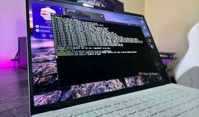 Image of the Lenovo Googlebook 15 and the Linux Terminal app.