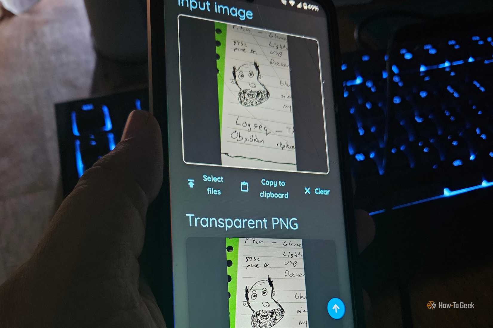 Creating a transparent PNG from a handrawn cartoon in Omni-Tools on an Android phone.
