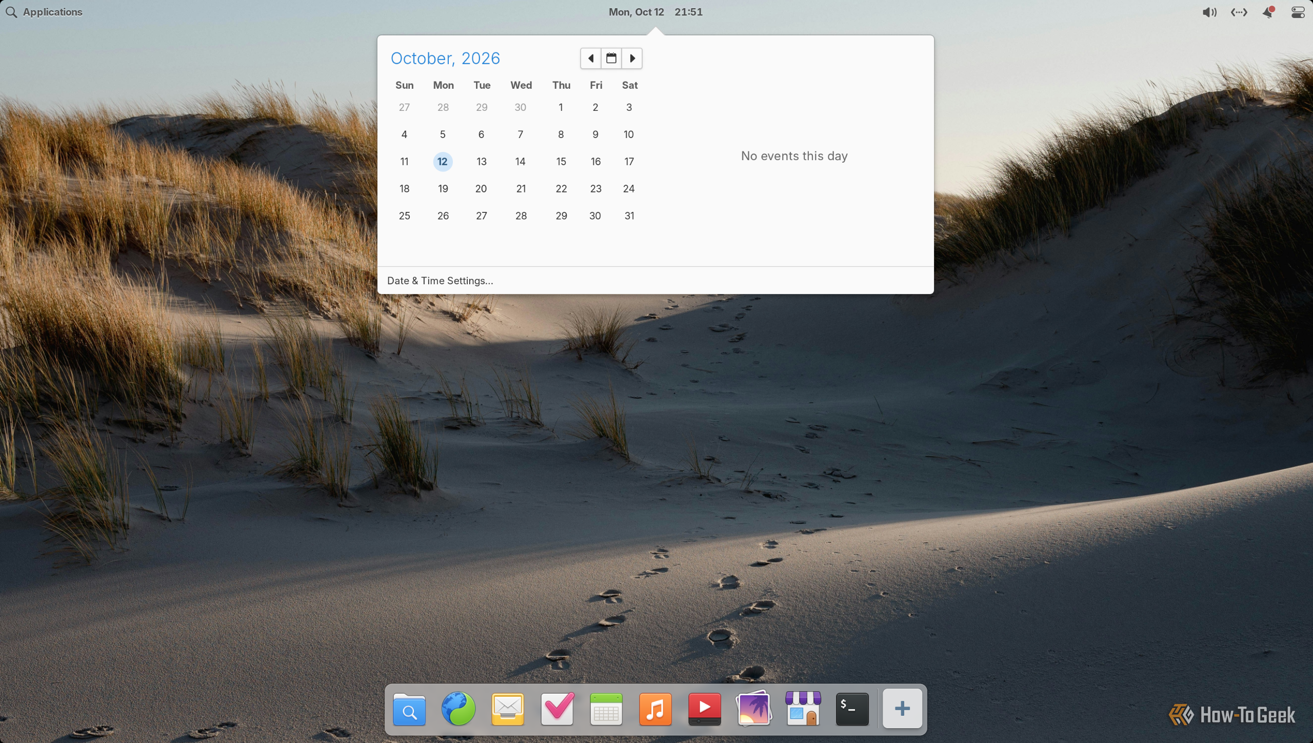 Pantheon calendar dropdown open from the top panel clock showing October 2026 with no events.