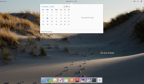 Pantheon calendar dropdown open from the top panel clock showing October 2026 with no events.