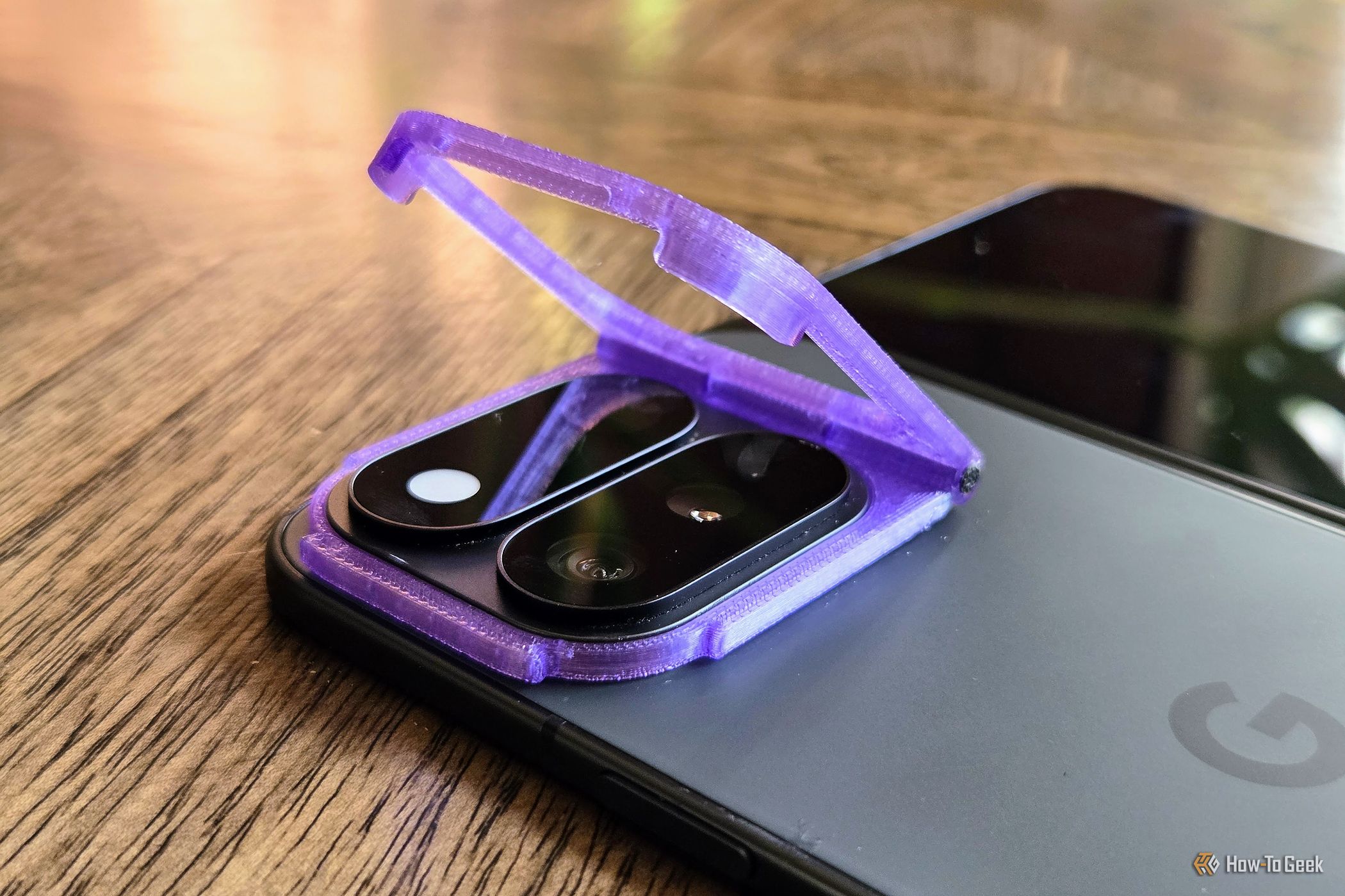 I hated my foldable phone's table wobble until I printed this folding accessory