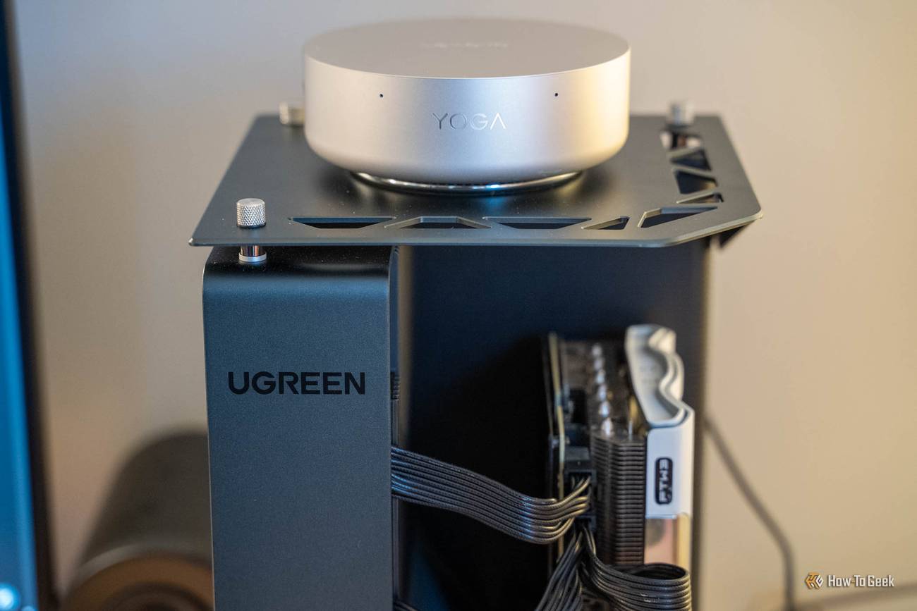 Lenovo Yoga Mini Gen 11 resting on the UGREEN LinkStation eGPU Dock's top shelf.