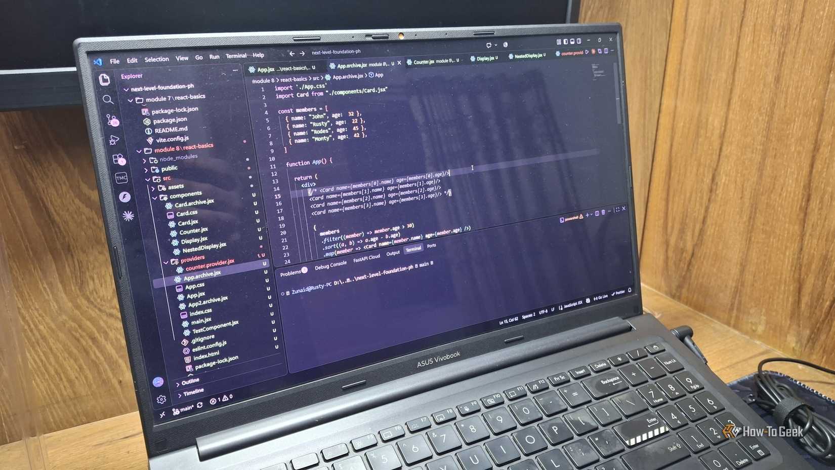 VS Code open with React code displayed.